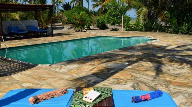 Spend your days relaxing by the pool lulled by the sound of the ocean at Kijongo Bay Resort.